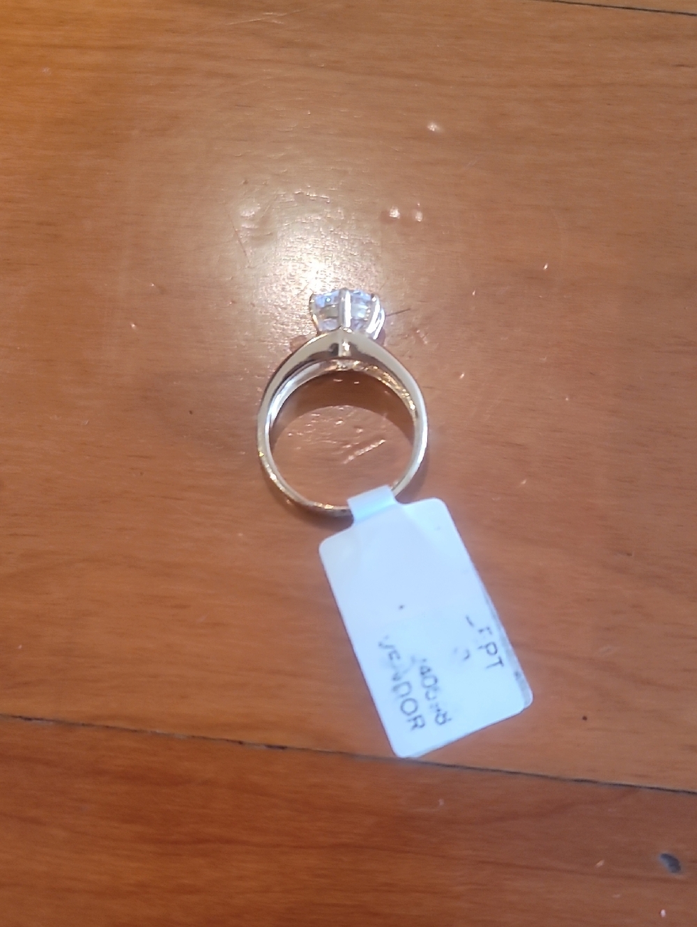 Gold Color Ring With Clear Stone On Top